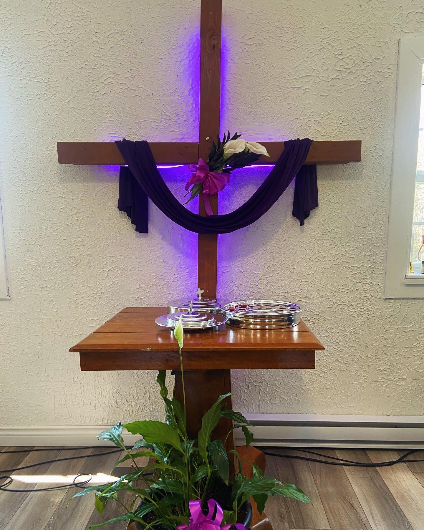 Lenten cross with purple draping